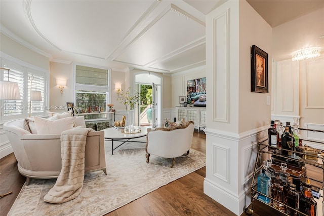 618 Valencia Ave Unit 101, Coral Gables, FL 33134 - living room with a decorative wall, wood finished floors, wainscoting, arched walkways, and ornamental molding