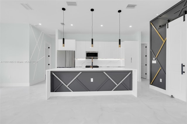 3209 45th St SW, Lehigh Acres, FL 33976 - kitchen with appliances with stainless steel finishes, white cabinetry, modern cabinets, light marble finish floors, and pendant lighting