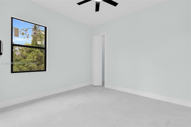 3209 45th St SW, Lehigh Acres, FL 33976 - empty room featuring ceiling fan and baseboards