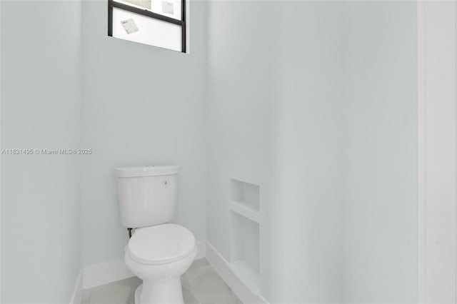 3209 45th St SW, Lehigh Acres, FL 33976 - bathroom with baseboards and toilet