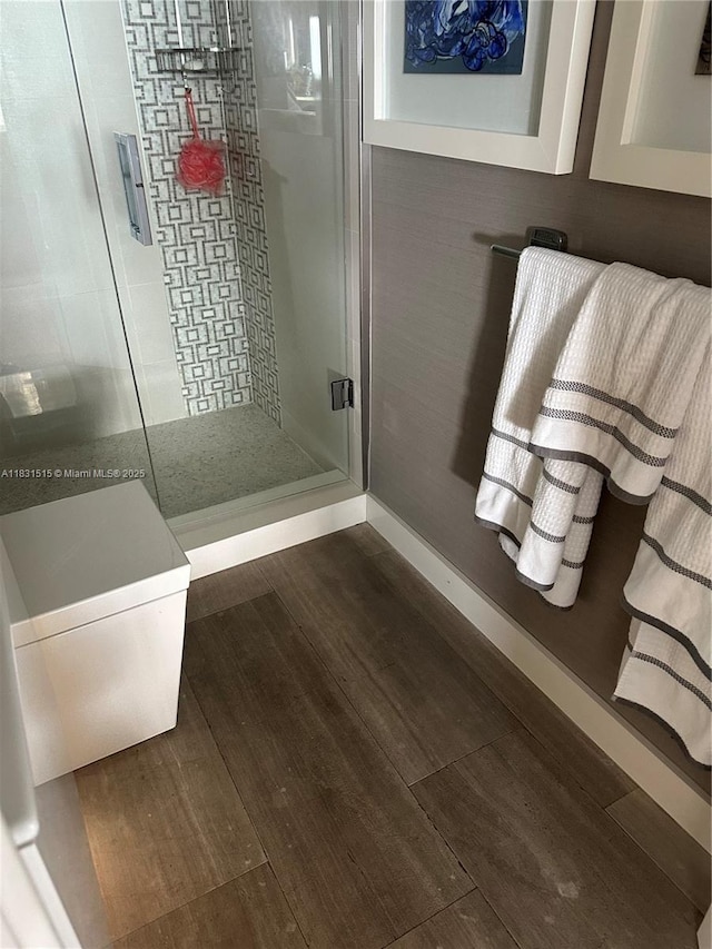2333 Brickell Ave Unit 901, Miami, FL 33129 - full bathroom featuring wood finished floors and a shower stall