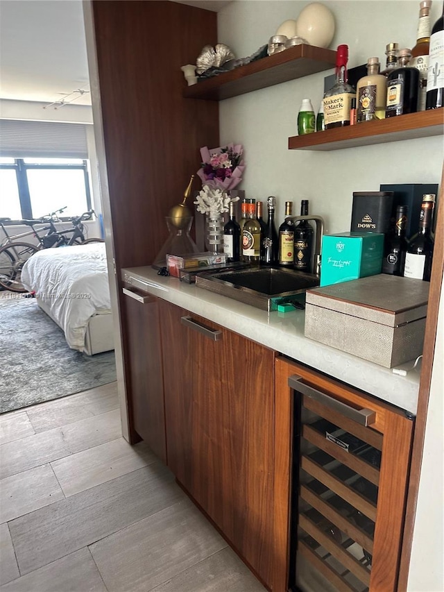 2333 Brickell Ave Unit 901, Miami, FL 33129 - indoor dry bar featuring wine cooler and light wood-style floors