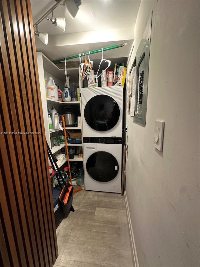 2333 Brickell Ave Unit 901, Miami, FL 33129 - laundry room featuring stacked washer and clothes dryer and electric panel