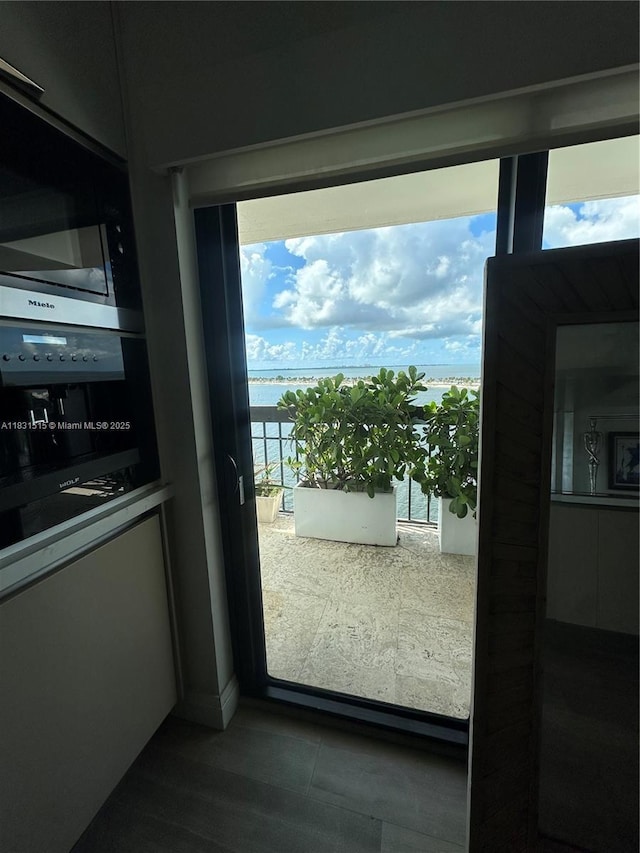 2333 Brickell Ave Unit 901, Miami, FL 33129 - doorway to outside featuring a water view