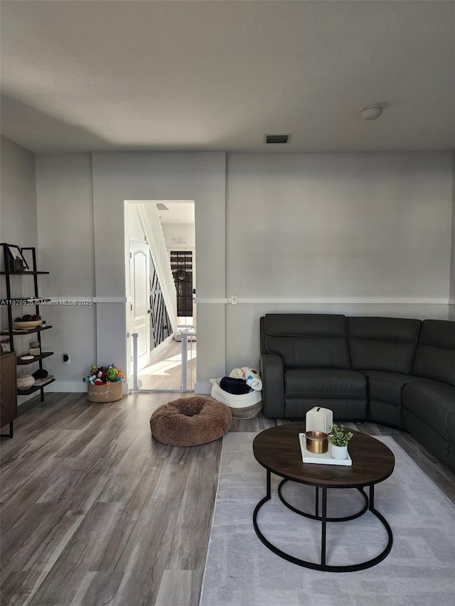 706 SW 147th Ave, Pembroke Pines, FL 33027 - living room featuring wood finished floors and stairway