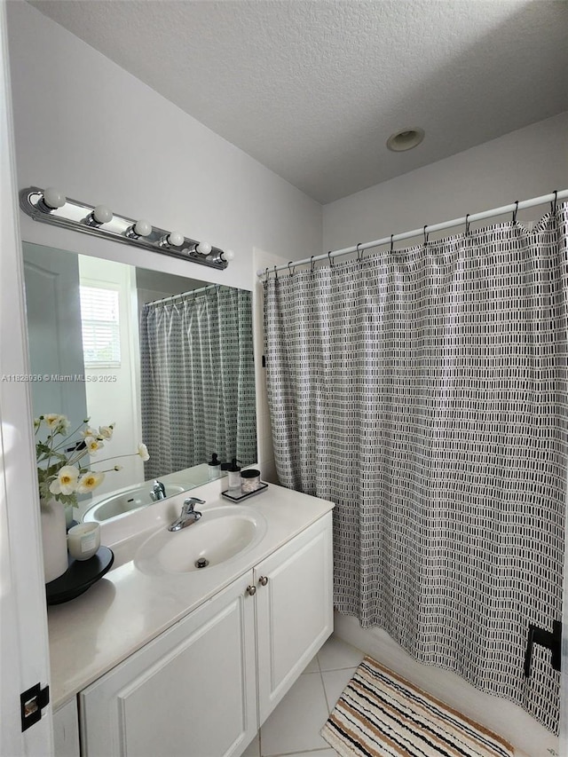 706 SW 147th Ave, Pembroke Pines, FL 33027 - full bath with vanity, a textured ceiling, tile patterned flooring, and curtained shower