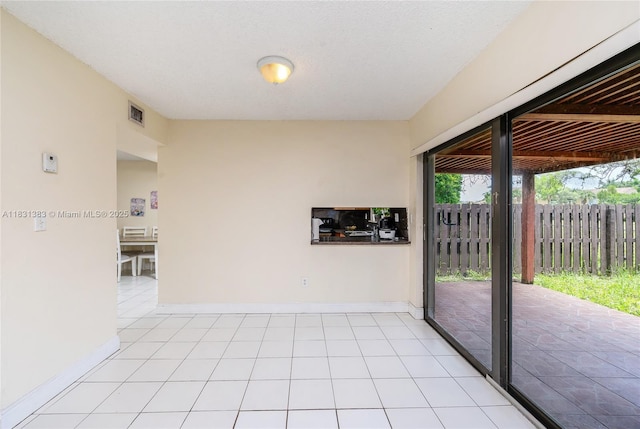 10114 NW 4th Ln Unit 3-12, Miami, FL 33172 - empty room featuring baseboards