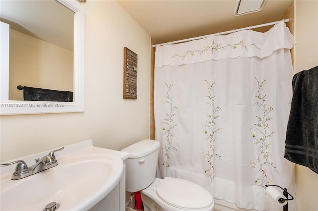 10114 NW 4th Ln Unit 3-12, Miami, FL 33172 - bathroom with a sink and shower / tub combo with curtain