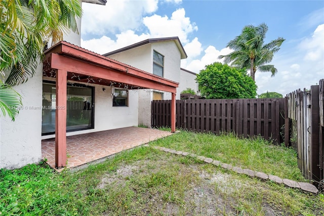 10114 NW 4th Ln Unit 3-12, Miami, FL 33172 - fenced backyard featuring a patio area