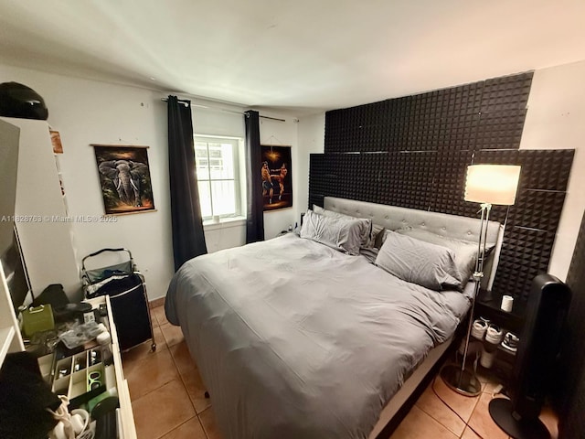 1308 Drexel Ave Unit 109, Miami Beach, FL 33139 - bedroom with light tile patterned floors