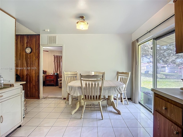1206 E 27th St, Bradenton, FL 34208 - dining area with light tile patterned floors