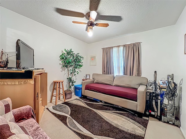 1206 E 27th St, Bradenton, FL 34208 - living area with ceiling fan and a textured ceiling