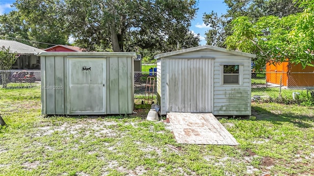 1206 E 27th St, Bradenton, FL 34208 - view of shed with a fenced backyard