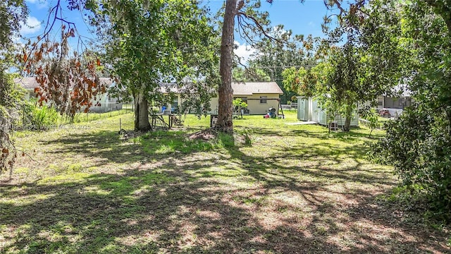 1206 E 27th St, Bradenton, FL 34208 - view of yard with an outdoor structure