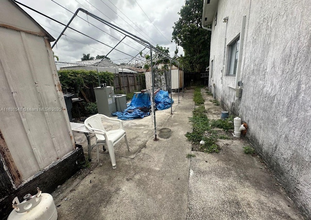 6641 Perry St, Hollywood, FL 33024 - fenced backyard with a shed and a patio area