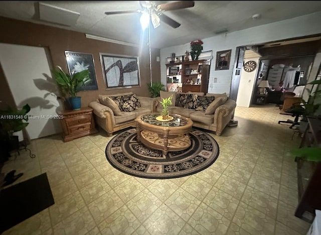 6641 Perry St, Hollywood, FL 33024 - living room featuring ceiling fan and tile patterned floors
