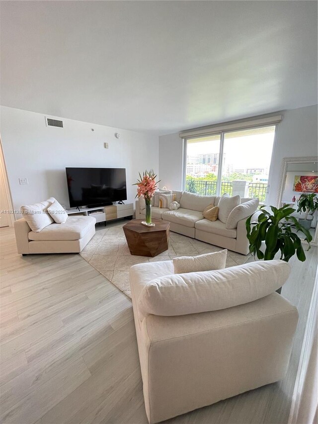2650 SW 37th Ave Unit 603, Miami, FL 33133 - living area featuring light wood-type flooring
