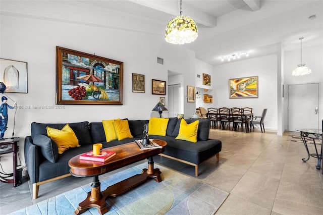 21133 SW 85th Ave Unit 404, Cutler Bay, FL 33189 - living area featuring a towering ceiling, beam ceiling, and a chandelier
