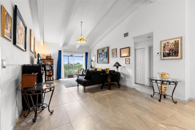 21133 SW 85th Ave Unit 404, Cutler Bay, FL 33189 - living area with beam ceiling, a chandelier, light tile patterned floors, high vaulted ceiling, and a textured ceiling