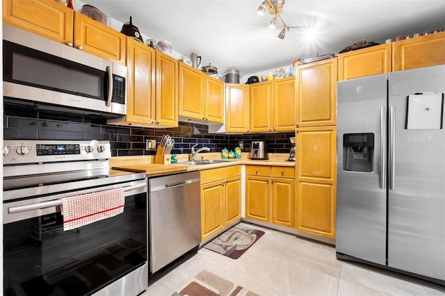 21133 SW 85th Ave Unit 404, Cutler Bay, FL 33189 - kitchen featuring stainless steel appliances, light countertops, and backsplash