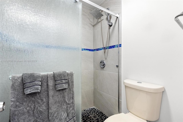 21133 SW 85th Ave Unit 404, Cutler Bay, FL 33189 - bathroom featuring a stall shower and toilet