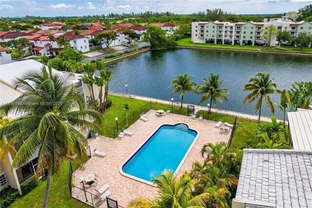 21133 SW 85th Ave Unit 404, Cutler Bay, FL 33189 - community pool with a water view and a patio