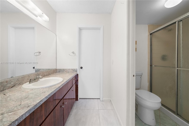 20905 NE 8th Ct Unit 101-36, Miami, FL 33179 - full bathroom with vanity, tile patterned flooring, and a shower stall