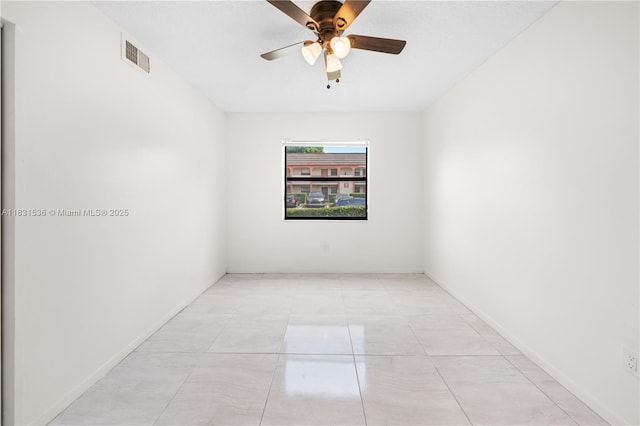 20905 NE 8th Ct Unit 101-36, Miami, FL 33179 - empty room with a ceiling fan and baseboards