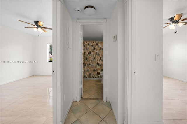 20905 NE 8th Ct Unit 101-36, Miami, FL 33179 - hall with light tile patterned floors