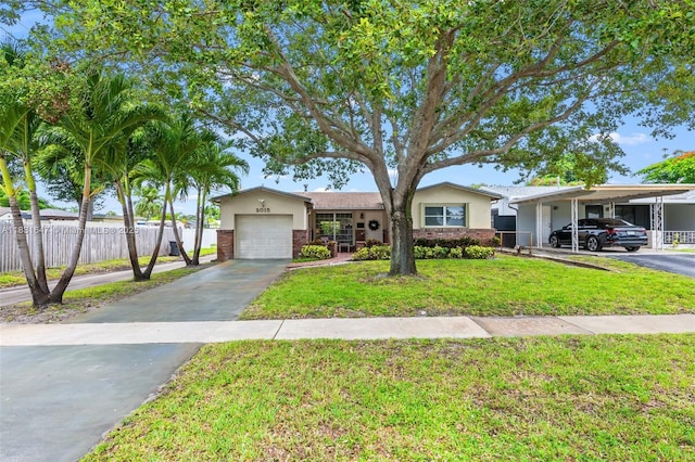 2015 N 37th Ave, Hollywood, FL 33021 - ranch-style home featuring asphalt driveway, stucco siding, a garage, and a carport