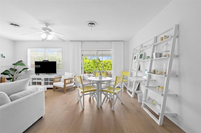 2015 N 37th Ave, Hollywood, FL 33021 - dining area featuring ceiling fan and wood finished floors