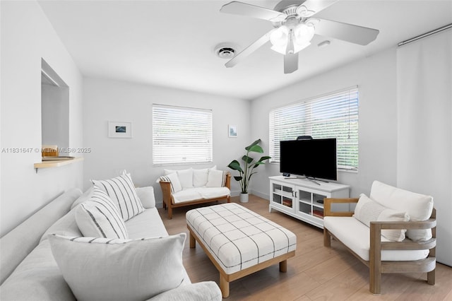 2015 N 37th Ave, Hollywood, FL 33021 - living area with a ceiling fan, plenty of natural light, and light wood-style flooring