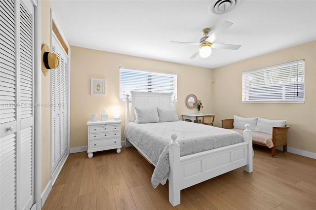 2015 N 37th Ave, Hollywood, FL 33021 - bedroom with multiple windows, light wood finished floors, and a ceiling fan