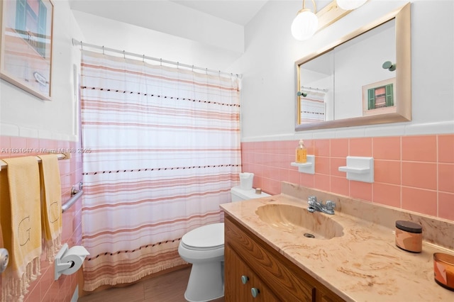 2015 N 37th Ave, Hollywood, FL 33021 - full bathroom with tile walls, vanity, wainscoting, curtained shower, and wood finished floors