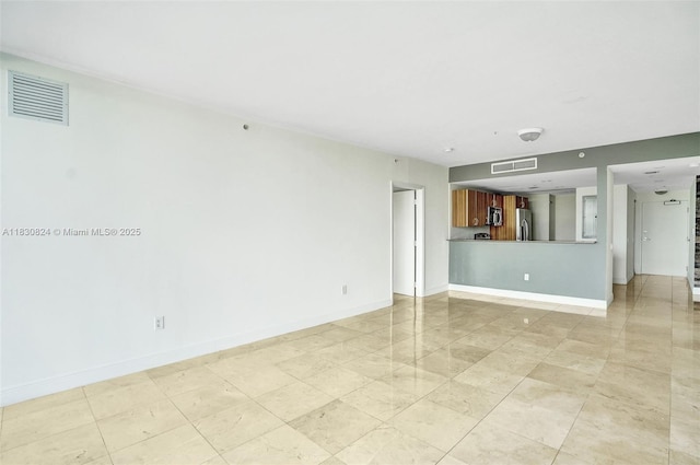 6305 Indian Creek Dr Unit 3B, Miami Beach, FL 33141 - unfurnished living room with baseboards
