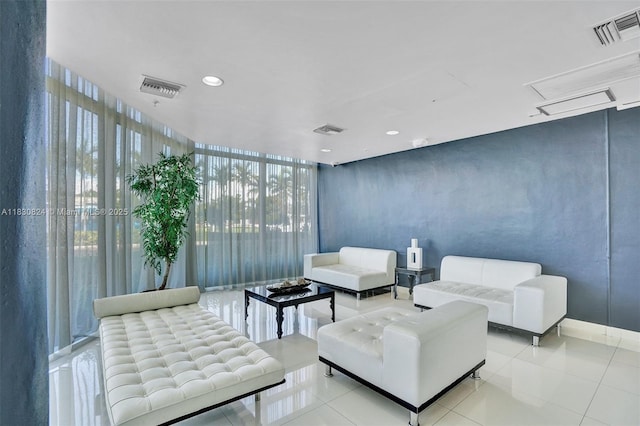 6305 Indian Creek Dr Unit 3B, Miami Beach, FL 33141 - lobby with expansive windows and recessed lighting