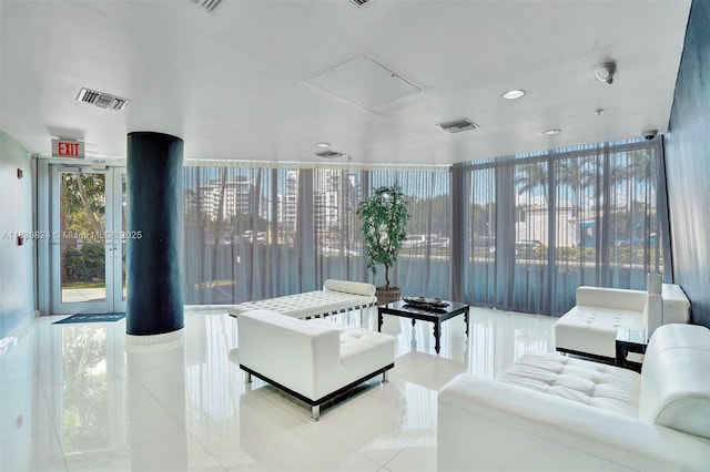 6305 Indian Creek Dr Unit 3B, Miami Beach, FL 33141 - lobby with expansive windows, recessed lighting, and a security system
