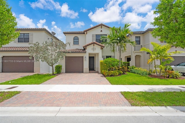 3274 W 96th Pl, Hialeah, FL 33018 - mediterranean / spanish-style house with decorative driveway, a garage, a tile roof, and stucco siding