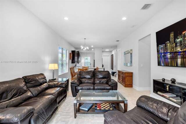 3274 W 96th Pl, Hialeah, FL 33018 - living area featuring a chandelier and recessed lighting