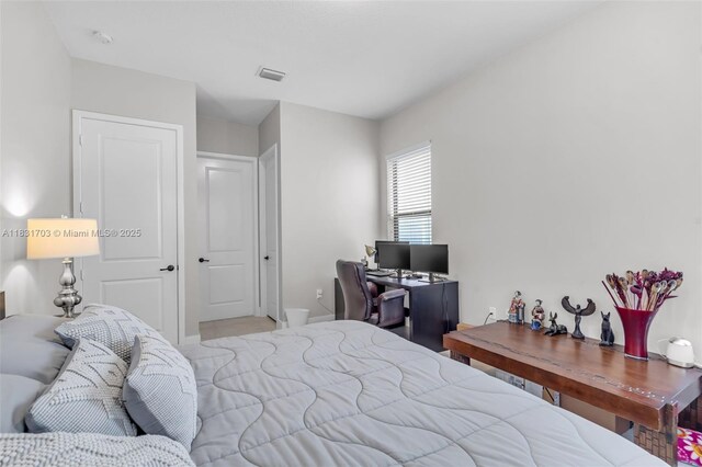 3274 W 96th Pl, Hialeah, FL 33018 - bedroom with a desk and baseboards