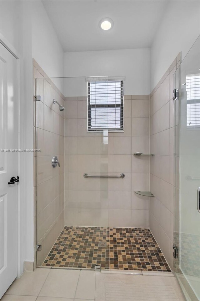 3274 W 96th Pl, Hialeah, FL 33018 - full bathroom with a shower stall and tile patterned floors