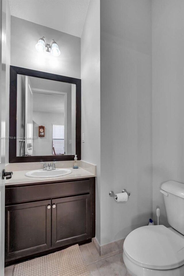 3274 W 96th Pl, Hialeah, FL 33018 - half bath with vanity and tile patterned flooring