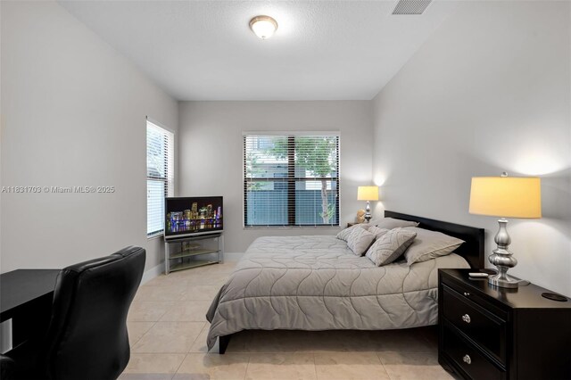 3274 W 96th Pl, Hialeah, FL 33018 - bedroom featuring light tile patterned flooring and baseboards