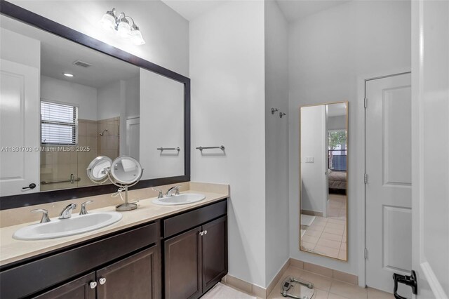3274 W 96th Pl, Hialeah, FL 33018 - ensuite bathroom featuring a tile shower, double vanity, and tile patterned flooring