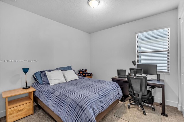 3274 W 96th Pl, Hialeah, FL 33018 - carpeted bedroom featuring baseboards and an office area