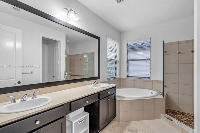 3274 W 96th Pl, Hialeah, FL 33018 - bathroom with double vanity, a garden tub, tiled shower, and tile patterned floors
