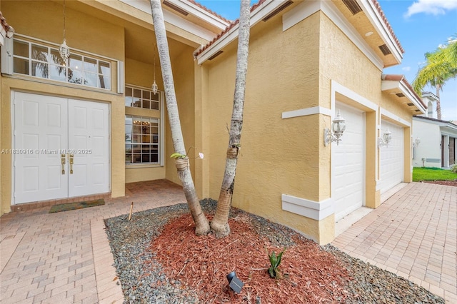 19442 SW 39th St, Miramar, FL 33029 - doorway to property featuring stucco siding and a tile roof