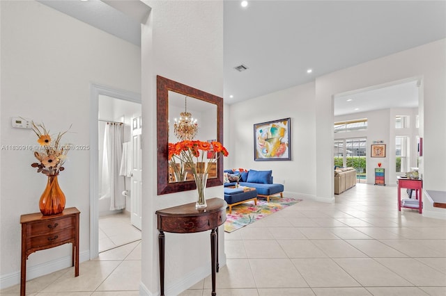 19442 SW 39th St, Miramar, FL 33029 - hallway with light tile patterned floors, recessed lighting, and a chandelier