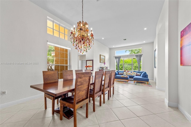 19442 SW 39th St, Miramar, FL 33029 - dining space with a chandelier, light tile patterned floors, recessed lighting, and a towering ceiling