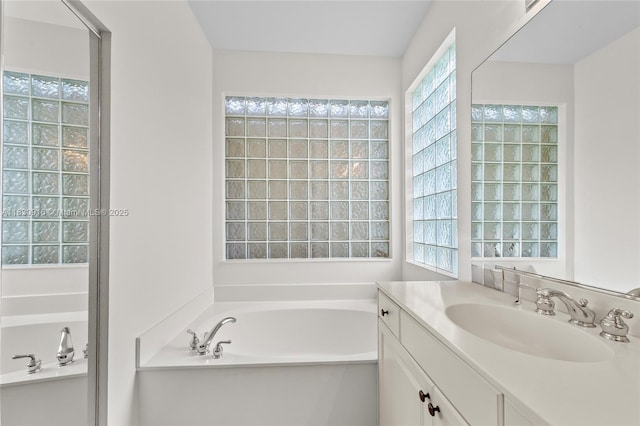19442 SW 39th St, Miramar, FL 33029 - full bathroom featuring a garden tub and vanity